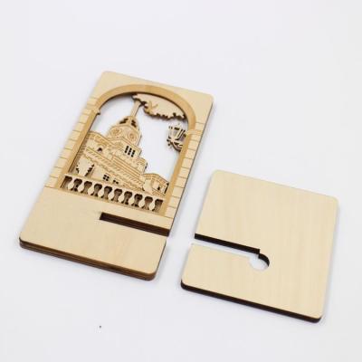 China Adjustable Mobile Phone Wooden Stand For Lazy People Phone Desktop Wooden Stand For Souvenirs In Tourist Attractions Gifts for sale