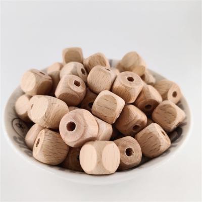 China Natural 12mm wooden beech wood die beads, pacifier wood beads, loose beech wood beads for sale