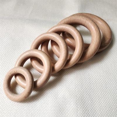 China Beech Wood 25-80mm Ring Natural Round Wooden Baby Teething Ring Circle DIY Necklace Ring for sale