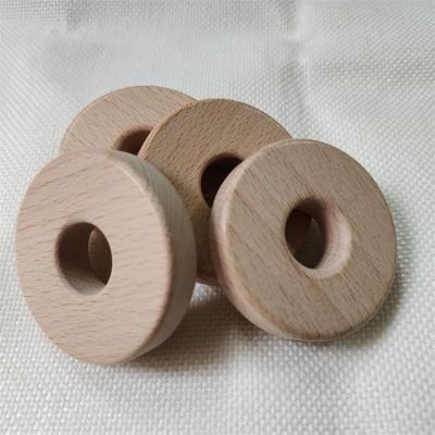 China 55x12mm Beech Wood Round Flat Shape Beech Wood Round Wooden Teething Ring Natural Round Wooden Teething DIY Baby Teether Circle for sale