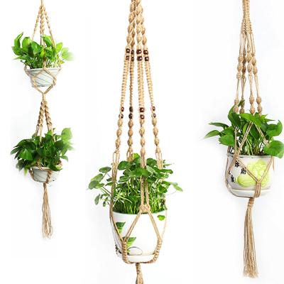 China Creative Handmade Plant Hanger Macrame Gardening Flower Pot For Plants Home Decor Handwoven Sling Hanger Cotton Rope Customize Logo for sale