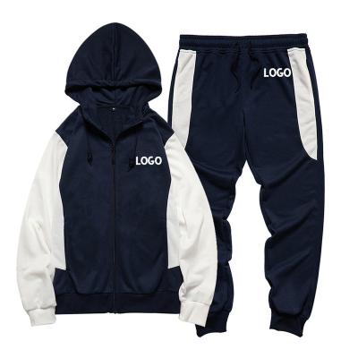 China Breathable Wholesales Custom Design Fleece Polyester Hoodie Sweatshirt Jogger Pants Colors Blocked Sweatsuit Tracksuit Set for sale