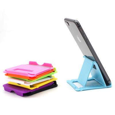 China Custom Adjustable Lazy Bracket Folding Multifunctional Mobile Phone Tablet Bracket Mobile Phone Universal Desktop Stand Holder for sale