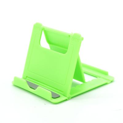 China Adjustable Adjustable Plastic Phone Holder Frames Portable Folding Phone Stand For All Mobile Phone Tablet for sale