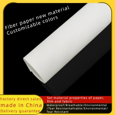 China Fiber waterproof paper material white solid color can be colorful waterproof fabric tearproof butter carton bag easy to print for sale