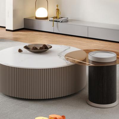 China Modern extendable light luxury minimalist style round coffee table rock slab living room designer combination for sale