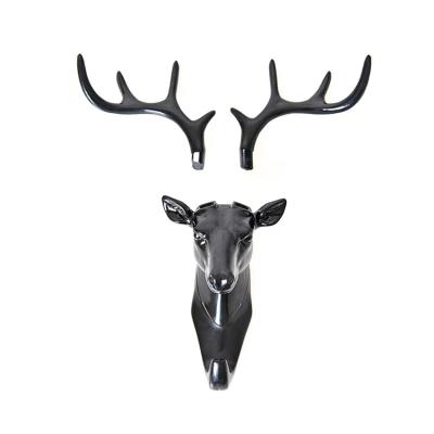 China Classic Black Viable Art Pictographic Traceless Hook Design Deer Head Hook Design for sale