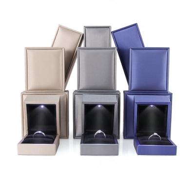 China Classic Elegant Vintage Luxury Brushed Leather Package Box LED Rings Packaging Box Jewelry Boxes Wholesale for sale