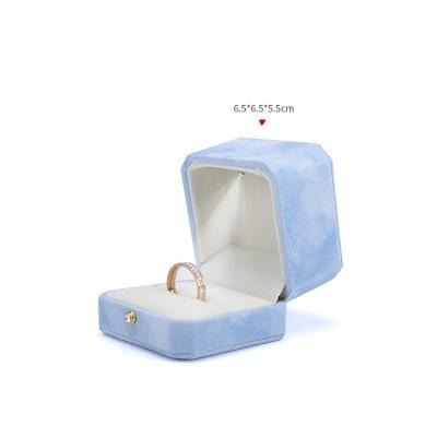 China Classic Elegant Vintage Good Quality LED Velvet Luxury Octagonal Jewelry Box Diamond Ring Packaging Box Blue for sale