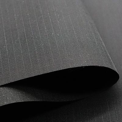 China 210 Waterproof Polyester Taffeta Fabric 0.3 Cm 7 Grid Plaid Taffeta Fabric for sale