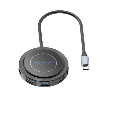 China Absorción magnética circular múltiple USB C Hub para computadoras portátiles teléfonos móviles consolas de juegos en venta