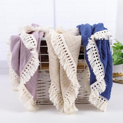 China Classics Newborn Wraps Cotton Infant Muslin Wrap Blankets For Newborn Baby Tassel Receiving Blanket for sale