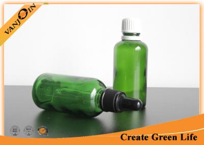 China 50ml Green Glass Bottles for Essential Oils Wholesale with Plastic Cap or Dropper for sale