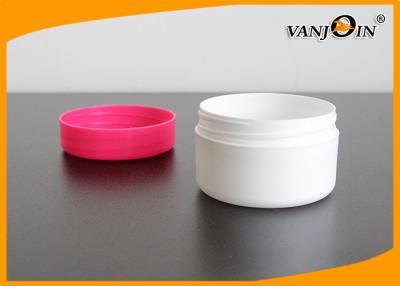 China HDPE Cosmetic Packaging White Face Cream Jar With Red Screw Lid 60g Plastic Small Jars for sale