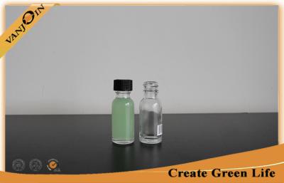 China 1oz Clear Glass Beverage Bottles , Glass Boston Round Bottles Customized for sale