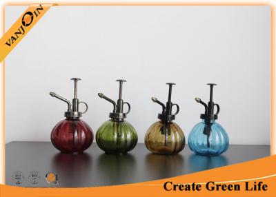 China Sprayed Pumpkin Shaped Glass Storage Jars with Lids , Glass Watering Can For Potted Plant for sale