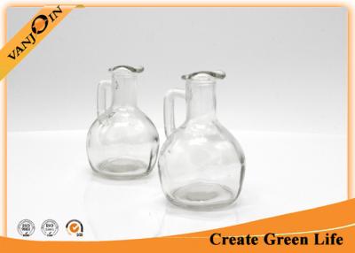 China 150ml Cute Round Glass Sauce Bottles With Handle for Oil Storing for sale