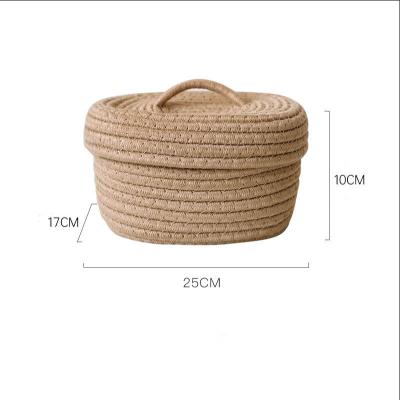 China Cord Woven Oval Organizer Desktop Sustainable Cotton Box With Lid Cosmetics Storage Rack Basket for sale