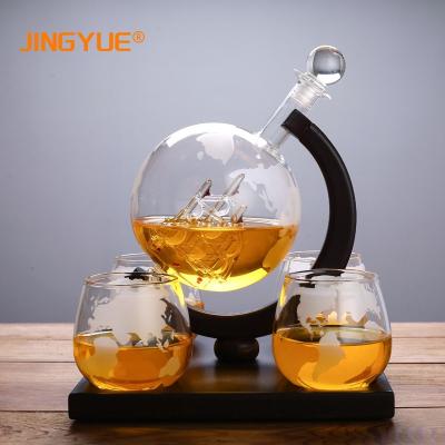 China New Amazon Classic/Postmodern Hot Sale 850ml Hand Blown Glass Globe Whiskey Decanter Set With 4 Etched Globe Whiskey Glasses For Liquor Scotch Bourbon for sale