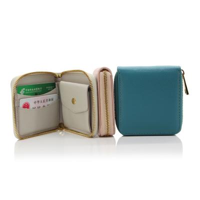 China Factory OEM lychee grain pvc design fashion zipper metal waterproof leather bifold cards cash coin wallet for sale