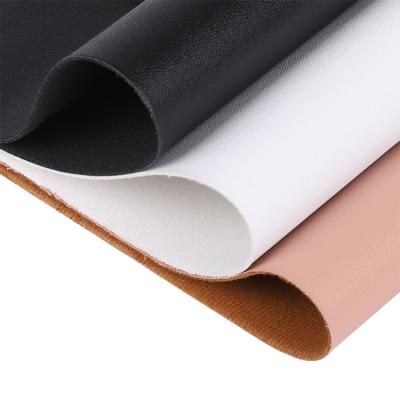 China Manufacturer Solid Matte Pink Embossing Leather Fabric Waterproof Professional Faux Leather Synthetic Leather for sale