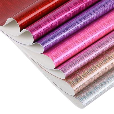 China Waterproof PVC Glitter Film Laminated Leatherette Fabric Faux Leather For Kids Bags Shoes Luggage for sale