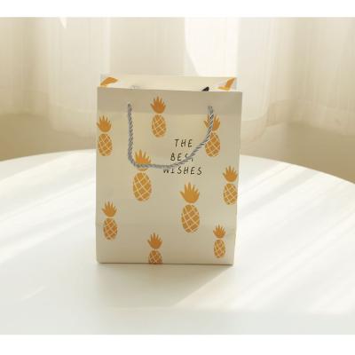 China Custom DIY Recycled Materials Waterproof Paper Bag Printing Your Design Wedding Gift Bag for sale