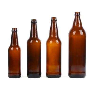 China Custom Beverage Logo 330ml Amber Empty Glass Beer Bottles With Crown Cap for sale