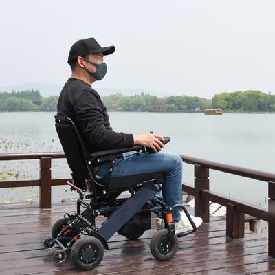 China Foldable PU Tyre Lightweight Motorized Wheelchair Compact for sale