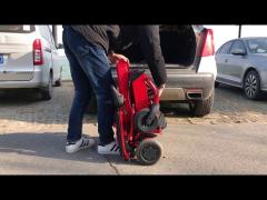 A Classic electric wheelchair that folds into the trunk