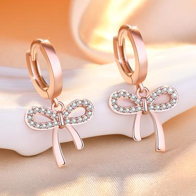 China Shining Bow Ear Stud Earrings Rose Gold Cooper Design Jewelry Simple Cute Vintage Bow-knot Female Zircon Stud Earrings for sale