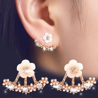 China FASHIONABLE Female Simple Small Crystal Flower Back Dangle Sweet Diamonds Daisy Stud Earrings for sale