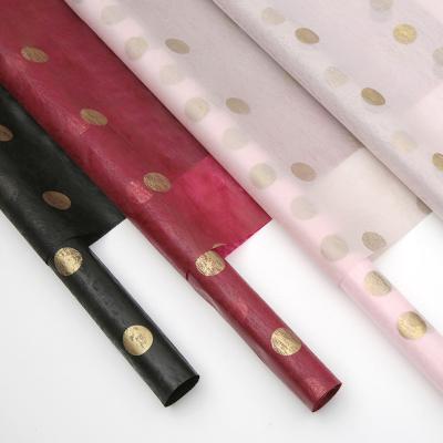 China Wholesale Waterproof Fabrics Korean Waterproof Non Woven Colored Dot Flower Wrapping Paper for sale