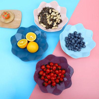 China Viable Hot Sale Petal Shape Fruit Tray Household Living Room Plastic Desktop Candy Snacks Melon Seeds Hard Fruit Tray Dry for sale