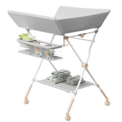 China Wholesale Foldable/Breathable/Washable Baby Bath and Changing Table Folding Portable Baby Changing Table with Wheels for sale