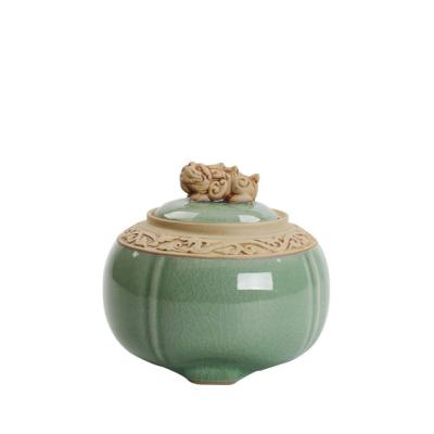 China Custom Green Ceramic Ash Urn Round Funeral Urn From Europe For Human Ashes for sale