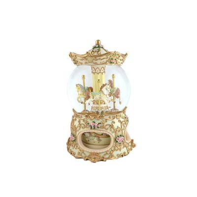 China Fancy Europe Resin Crafts Custom Snow Globe Unique Water Ball For Home Decor for sale