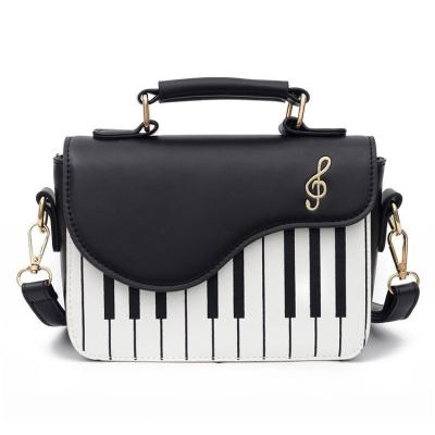 China New fashion ladies pinch shoulder bag fancy designer handbag purse cute piano women handbag for sale