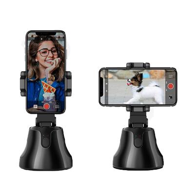 China Dropshipping Automatic Touch Screen Selfie Stick Tracking Camera Mobile Phone Bracket for sale