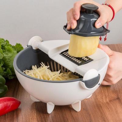 China Hold in Hand Multifunctional Vegetable Kitchen Slicer Potato Cucumber Slicing Grater Hand Fruit Draining Basket Guard for sale