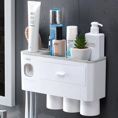 China Modern Toothbrush Storage Holder Bathroom Non Puncture Gargle Cup Organizer Holder Wall Mounted Squeeze Toothpaste Magic Items for sale