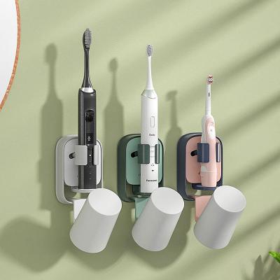 China 2021 Multifunctional Modern Wall Mounted Gravity Sensor Electric Toothbrush Holder No Drain Cup Storage Bathroom Drill Organizer for sale