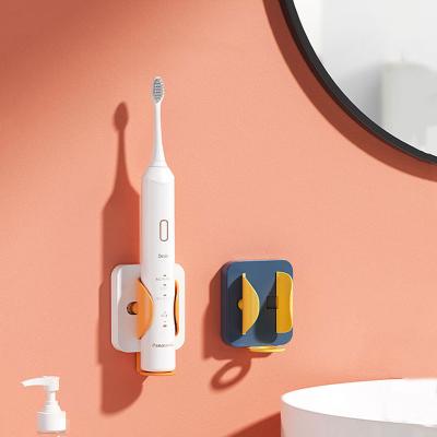 China New Gravity Sensor Electric Toothbrush Holder Modern Creativity No Trace Bracket Wall Mounted Save Space Bathroom Accessories for sale