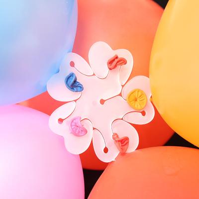 China Promotional Toy Hot Selling Transparent Flower Shape Balloons Clips for sale