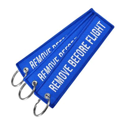 China Remove Before Flight Jewels REMOVE BEFORE FLIGHT Embroidered Tag Blue Color Embroidery Key Chain Gussets For Pilots for sale