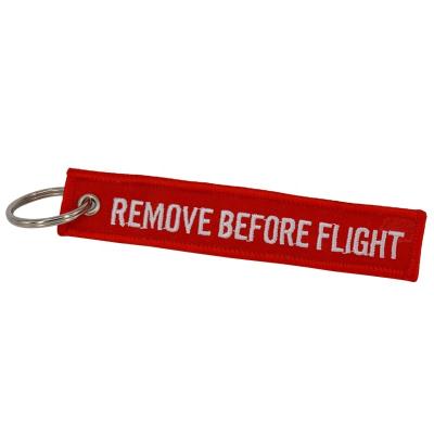 China Embroidery Key Chains Remove Before Flight Aviation Gifts Key Indicator Fashion Key Chain for sale