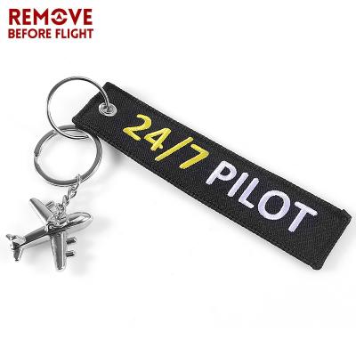 China Promotion Gift 24/7 POLISH Key Indicator Light Attendants Luggage Key Chains Metal Airplane Key Chains For Lover Gift for sale