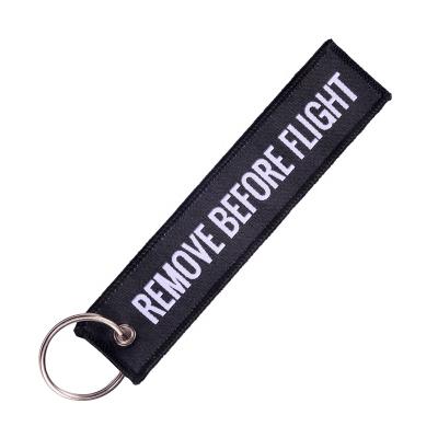 China Polyester Twill Fashion Jewelry Key Chain Take Off Flight Front Black With White Letters Woven Key Chain Aviation Gifts 5.12