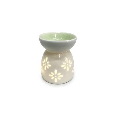 China Aroma Oil Burner Aroma Oil Warmer Candle Holder White Ceramic Wax Cast Iron Home Decor for sale