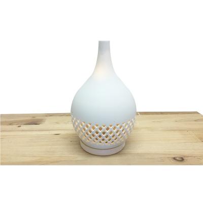 China Hotel New Design White Porcelain Ultrasonic Ceramic Humidifier 300ml Flower Aroma Oil Diffuser for sale